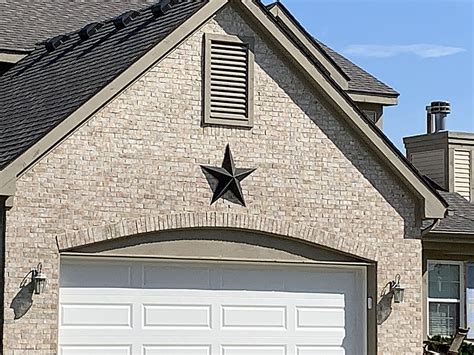 is metal stars on houses mean|big metal star on house.